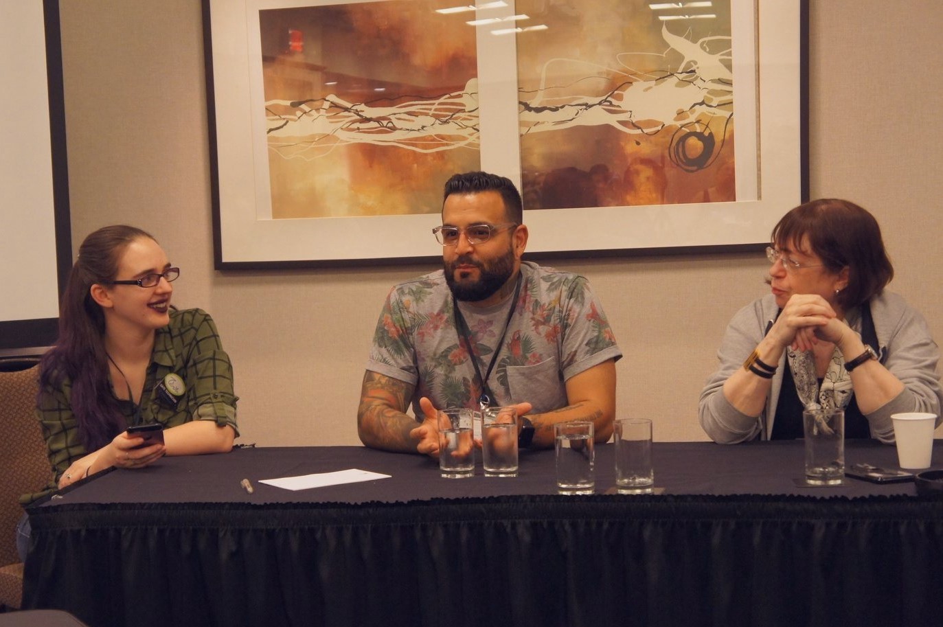 Sarah, Mark and Diane in conversation during a panel